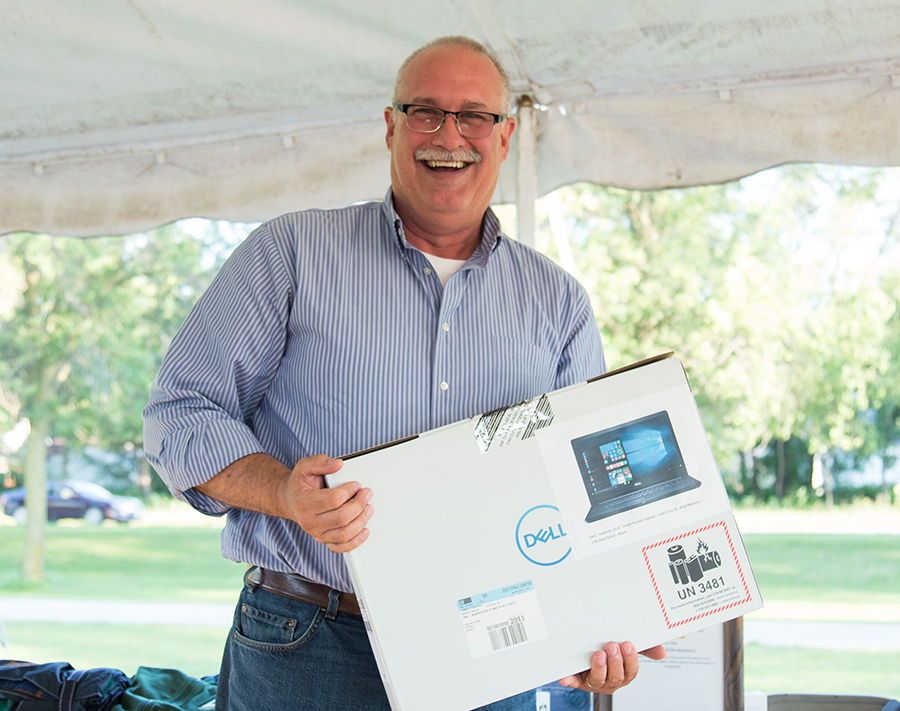 Person holding laptop box